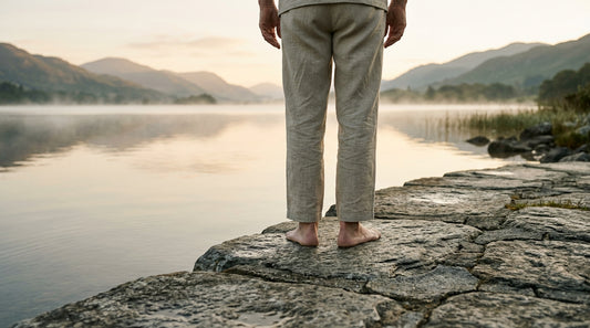 A woman in her 40s enjoying a glass of hydrogen-rich water after a morning workout to support metabolic health